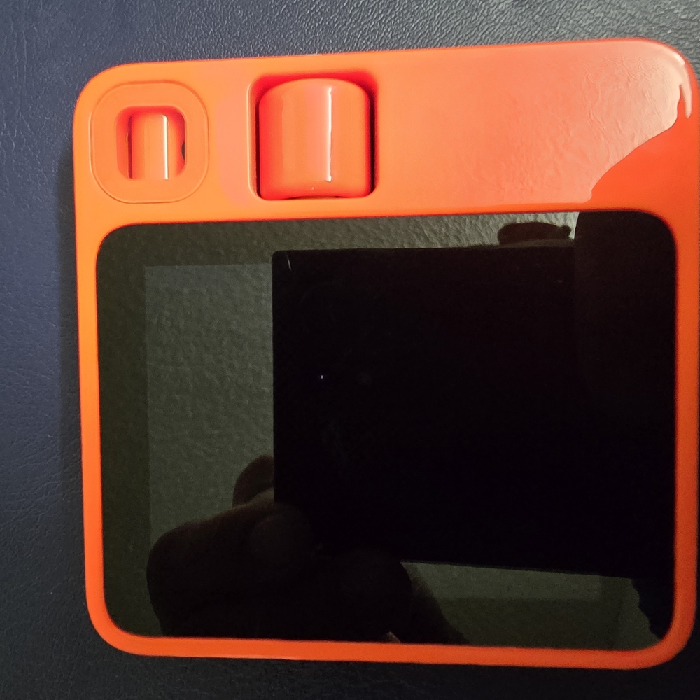 Orange Square Device with Black Screen
